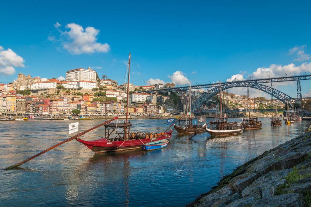 iStock-636634772-Portugal-Boast-Carring-Wine-in-Porto-©PocholoCalapre